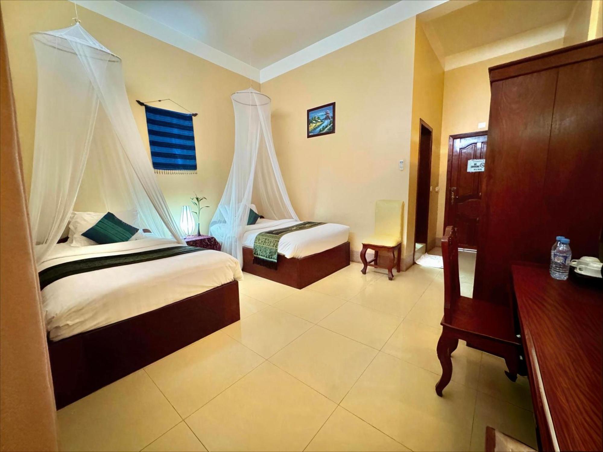 Shining Angkor Boutique Hotel Siem Reap Quarto foto