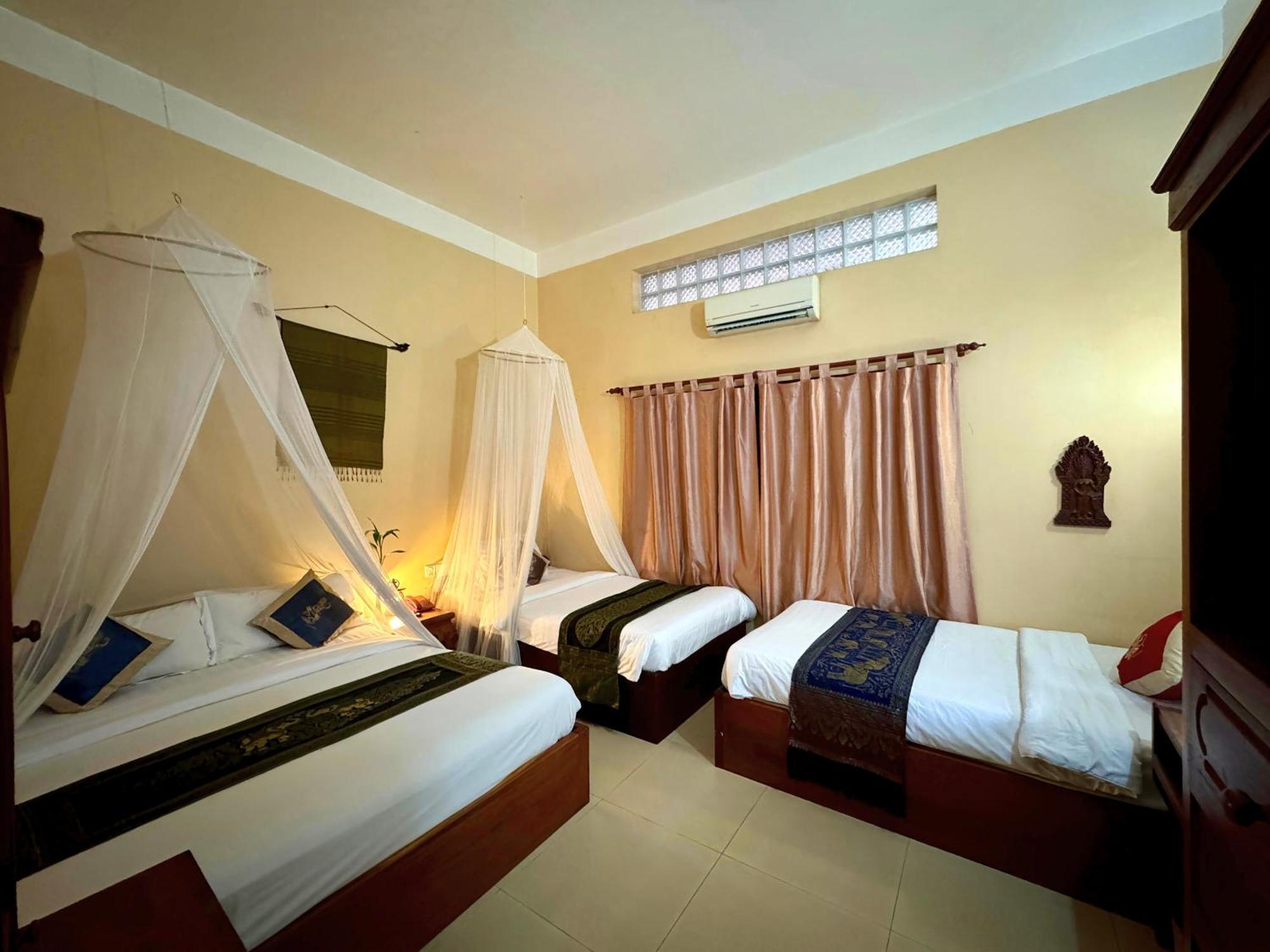 Shining Angkor Boutique Hotel Siem Reap Quarto foto