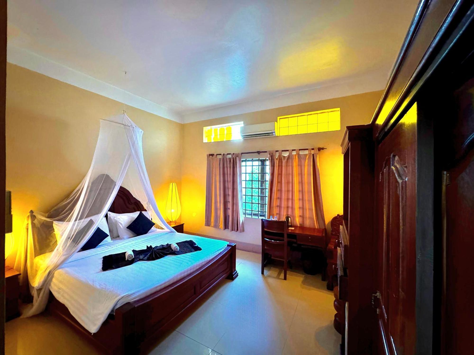 Shining Angkor Boutique Hotel Siem Reap Quarto foto